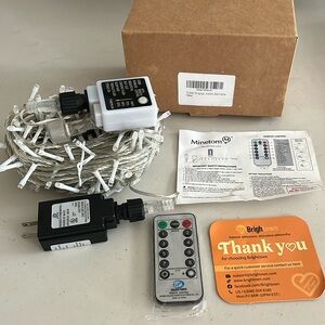 Minetom outdoor string lights w/remote control —warm whites (color)